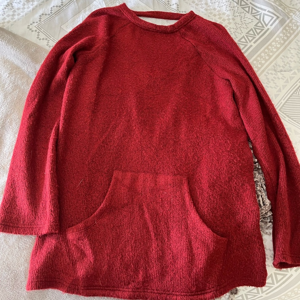Red Sweater with open back.